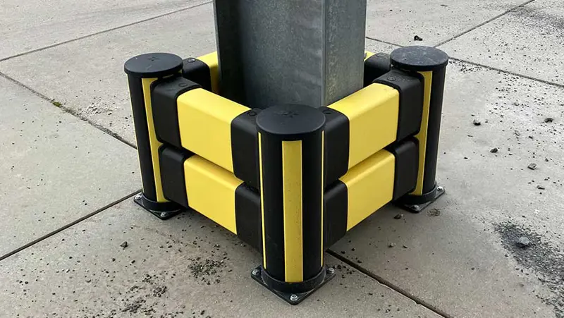 black and yellow impact protection protecting a pillar 